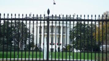 The white house view looked behind the fence in Washington DC photo