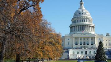 The Washington DC city view with the Capitol Hill building as background in autumn photo