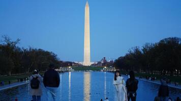 The monument tower view with the sunset sky as background in Washington DC photo
