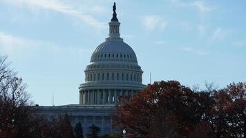 The Washington DC city view with the Capitol Hill building as background in autumn photo