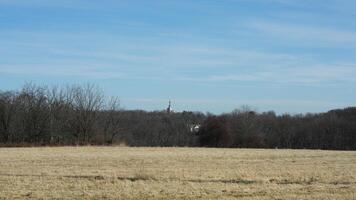 The wild forest view in the countryside of the city in winter photo