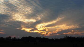 The beautiful sunset sky view with the colorful clouds as background photo
