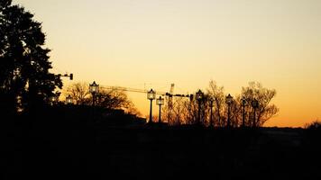 The beautiful sunset city view with the silhouette of the monument tower in Washington DC photo