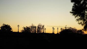 The beautiful sunset city view with the silhouette of the monument tower in Washington DC photo