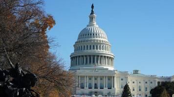The Washington DC city view with the Capitol Hill building as background in autumn photo