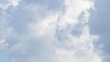 Soft White and Gray Clouds in a Calm Sky photo