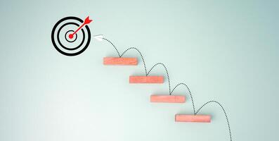 Block step on green background with target board icon on green background, Goal of business, Success and business target concept, Project management, company strategy, Business Obstacles and Risks. photo