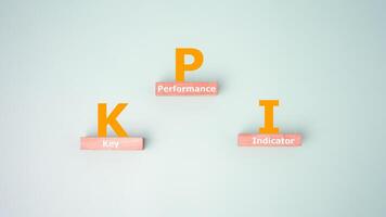 Key Performance Indicators, KPI concept, with icons of strategy, Objective, performance, Optimization to measure achievement versus planned target and achieve the right success for business. photo