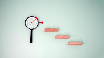 Block step on green background with target board icon on magnifying glasses, Goal of business, Success and business target concept, Project management, company strategy, Business Obstacles and Risks. photo