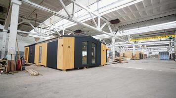 A new wooden modular prefabricated house in factory video