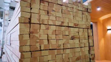 Lumber of wood for a prefabricated wooden house in factory of manufacture video