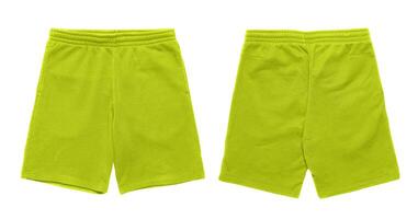 Pair of bright green shorts on white background. photo