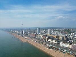 Aerial View of British Tourist Attraction of Beach and Ocean at Brighton and Hove Coastal City of England United Kingdom. High angle Footage of British Tourist Attraction Was Captured on May 9th, 2024 photo