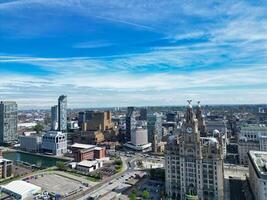 High Angle View of Historical and Modern British City Centre of Liverpool, Maritime city in northwest England, United Kingdom. Aerial Footage Was Captured with Drone's Camera on May 5th, 2024 photo
