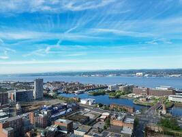 High Angle View of Historical and Modern British City Centre of Liverpool, Maritime city in northwest England, United Kingdom. Aerial Footage Was Captured with Drone's Camera on May 5th, 2024 photo