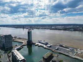 High Angle View of Historical and Modern British City Centre of Liverpool, Maritime city in northwest England, United Kingdom. Aerial Footage Was Captured with Drone's Camera on May 5th, 2024 photo