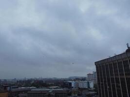High Angle View of Cardiff City Centre and Buildings at Central Downtown and Near to Ocean Bay During Rainy and Cloudy Day of May 28th, 2024 photo