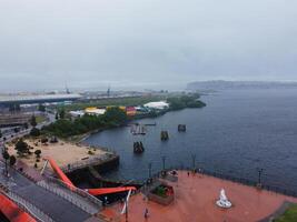 High Angle View of Cardiff City Centre and Buildings at Central Downtown and Near to Ocean Bay During Rainy and Cloudy Day of May 28th, 2024 photo