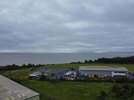 High Angle View of Cardiff City Centre and Buildings at Central Downtown and Near to Ocean Bay During Rainy and Cloudy Day of May 28th, 2024 photo