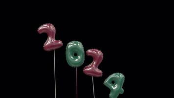 colored new year mylar balloon writing 2024 with the 4 flying away and 5 floating up to form 2025 magenta and mint video
