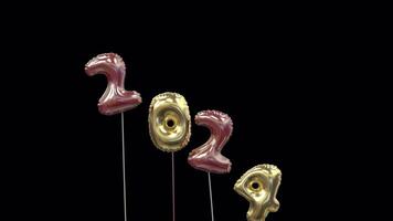 colored new year mylar balloon writing 2024 with the 4 flying away and 5 floating up to form 2025 Red and gold video