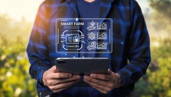 Man holding tablet with smart farm concept photo