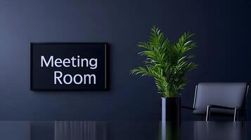 Meeting Room sign on office glass wall with empty collaboration workspace, large table, and armchairs in background. photo