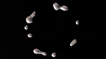 Circle with dynamic silver liquid splashes on black background. Futuristic fluid, metallic surface. Flowing, molten metal. Copy space in the middle. Y2k style. 3D animation. video