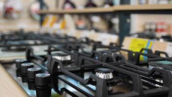 Row of gas stoves in household appliance store video