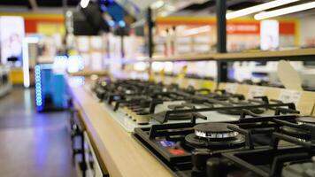 Burners gas stove and cooker hoods in store video