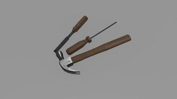 A hammer and a screwdriver on a gray background photo