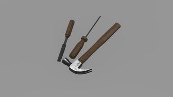 A hammer and a screwdriver on a gray background photo