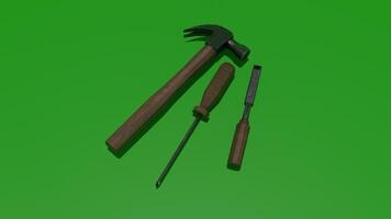 A hammer and screwdriver on a green background photo