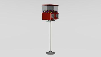 A gumball machine on a stand with a red base photo