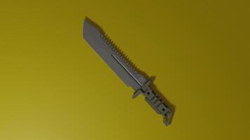 A knife on a yellow background with a black handle photo
