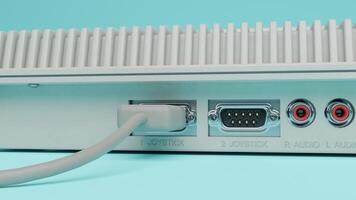A close up of a computer with a cable connected to it photo