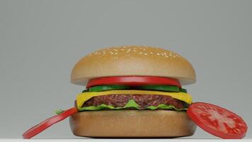 A hamburger with a tomato and a slice of cheese photo