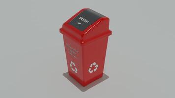 A red trash can with a recycling symbol on it photo