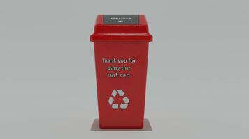 A red trash can with a recycling symbol on it photo