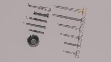 A set of surgical instruments on a gray surface photo