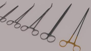A set of surgical instruments are shown on a gray background photo