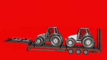 Two tractors are on a trailer with a red background photo