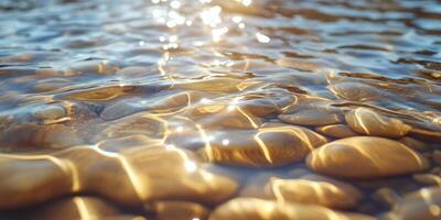 Sunlit Ripples Over Smooth River Stones photo