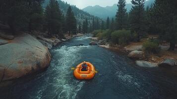 A lone rafter navigates a rushing river amidst towering trees and a misty mountain backdrop. photo