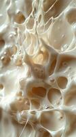Abstract Close-Up of White, Creamy Substance with Air Bubbles photo