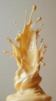 A Golden Liquid Splashing and Creating a Whimsical Shape photo