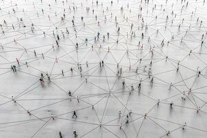 Network of People Walking Across Abstract Grid for Connection and Communication Concepts photo