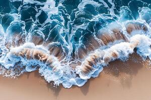 Breathtaking Aerial View of Ocean Waves Crashing on Sandy Shoreline - Ideal for Travel and Nature Themes photo