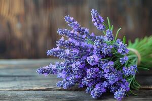 Freshly Picked Lavender Bouquet on Rustic Wooden Surface for Aromatherapy and Design photo
