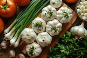 Fresh Harvest Garlic, Tomatoes, and Green Onions for Rustic Cooking and Culinary Inspiration photo